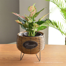 Home decoration plastic rattan durable flower baskets flower pots and planters use metal stand planter